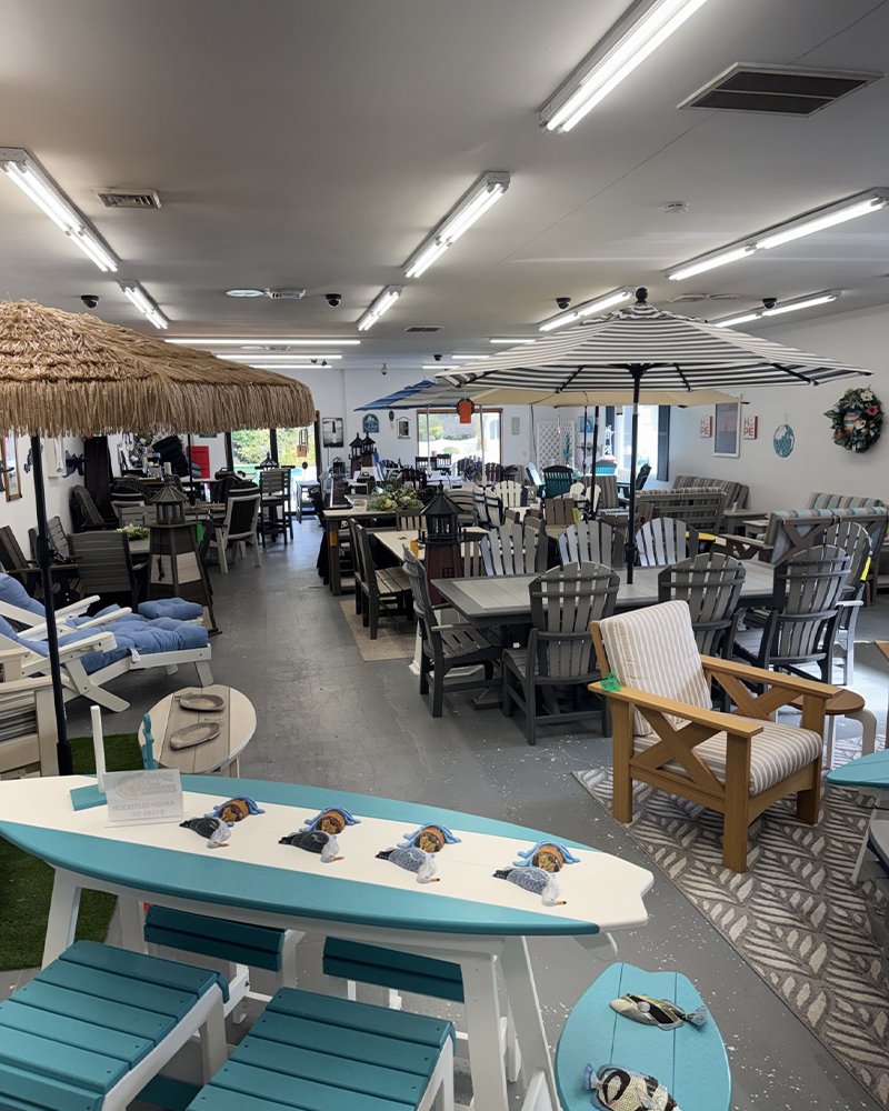 Amish and American-made outdoor furniture for Little Egg Harbor, showroom with tables and umbrellas.